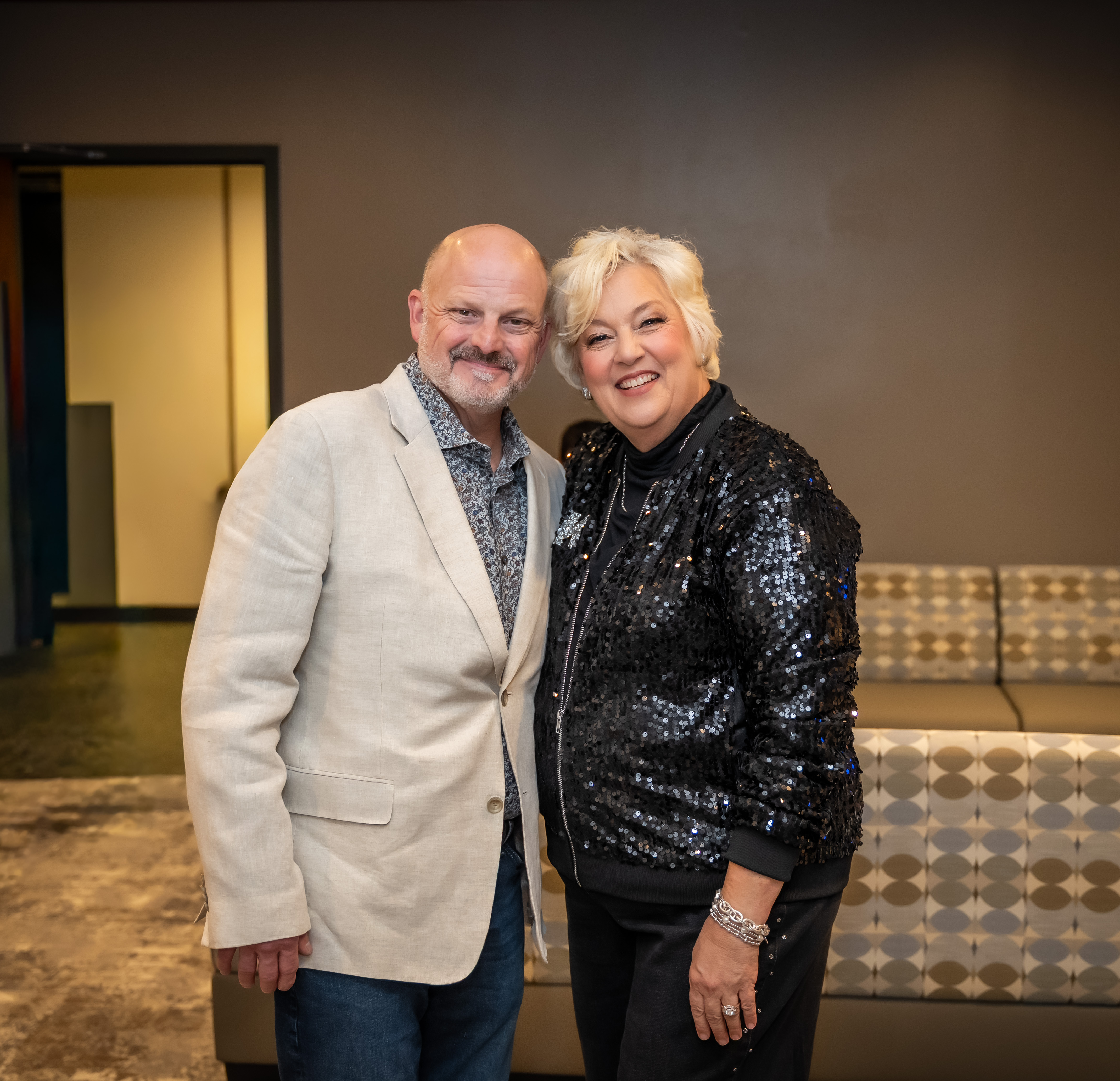 Nelda Buckman with her husband Karl, in conversation